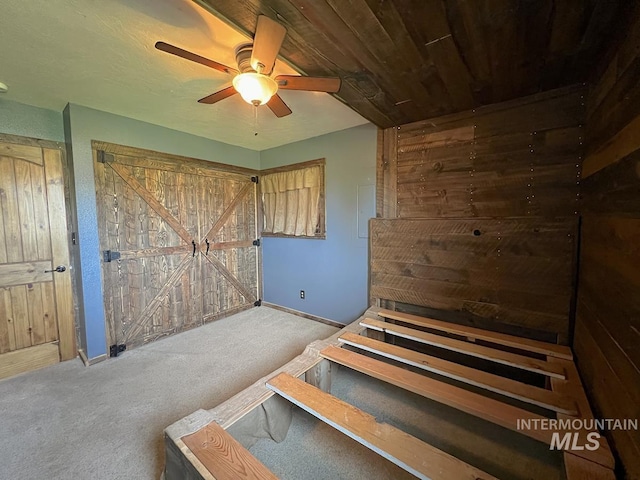 13974 Rustic Rd, Mccall, ID 83638 - carpeted bedroom with baseboards and ceiling fan