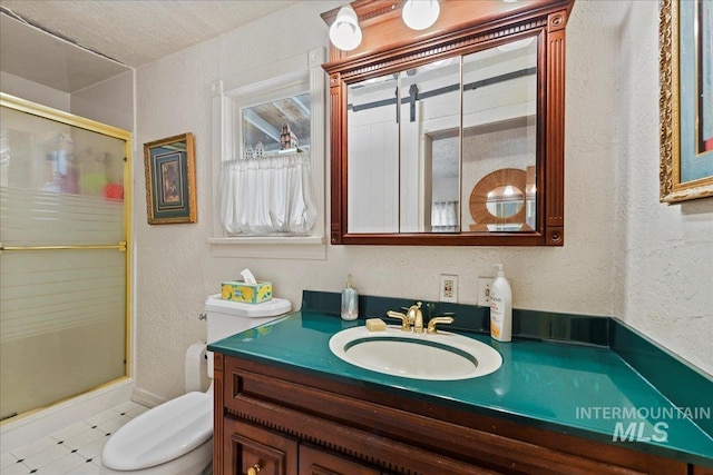 414 S 18th Ave, Caldwell, ID 83605 - bathroom with toilet, a stall shower, vanity, and a textured wall