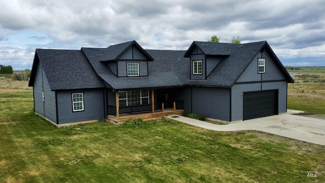 166 Eric Rd, Shoshone, ID 83352 - view of front of property featuring a porch, concrete driveway, and a front lawn