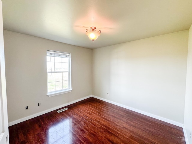 166 Eric Rd, Shoshone, ID 83352 - spare room with dark wood finished floors and baseboards