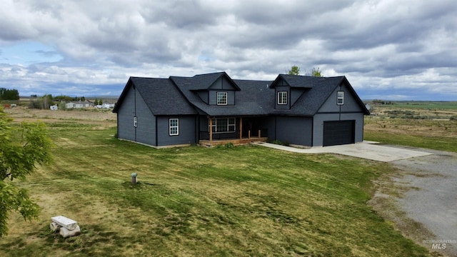 166 Eric Rd, Shoshone, ID 83352 - view of front of property featuring concrete driveway, covered porch, and a front lawn