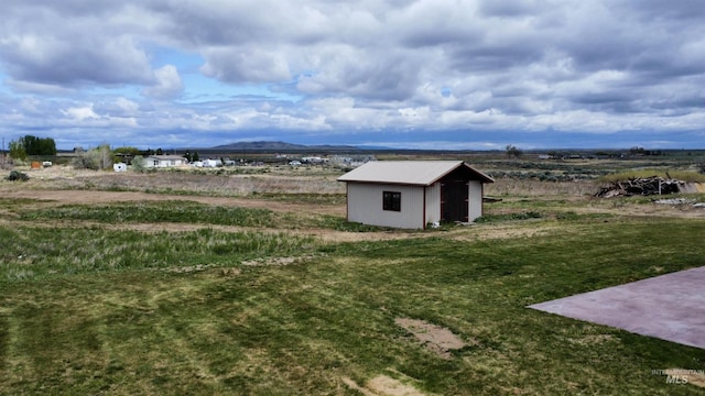 166 Eric Rd, Shoshone, ID 83352 - view of grassy yard with a mountain view