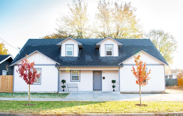 view of new england style home