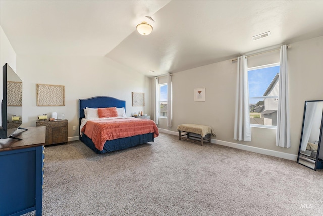 12817 Ironstone Dr, Nampa, ID 83651 - carpeted bedroom featuring lofted ceiling and baseboards