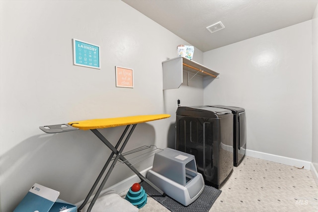 12817 Ironstone Dr, Nampa, ID 83651 - laundry room featuring baseboards and washer and clothes dryer