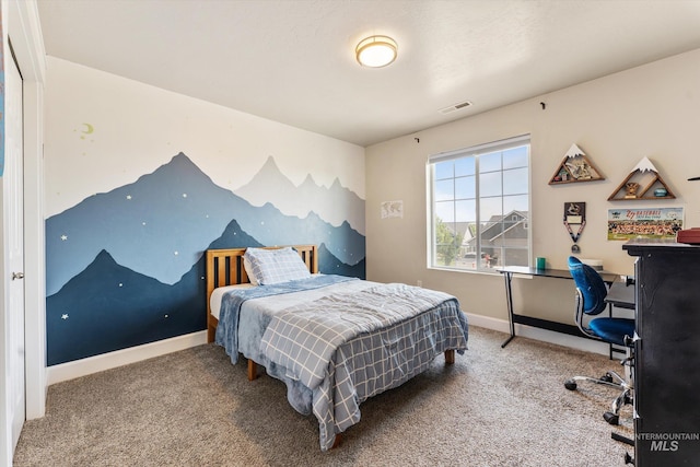12817 Ironstone Dr, Nampa, ID 83651 - carpeted bedroom with a desk and baseboards