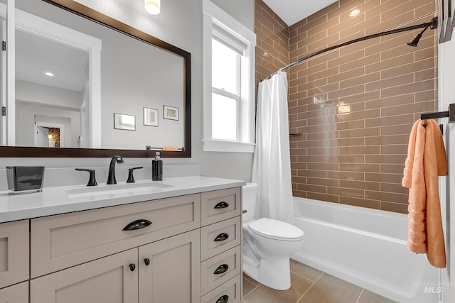 bathroom with shower / tub combo, tile patterned flooring, toilet, and vanity