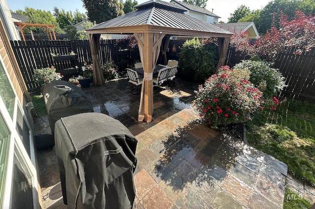 6023 S Augustine Ave, Boise, ID 83709 - fenced backyard with a gazebo, a patio, and outdoor dining area