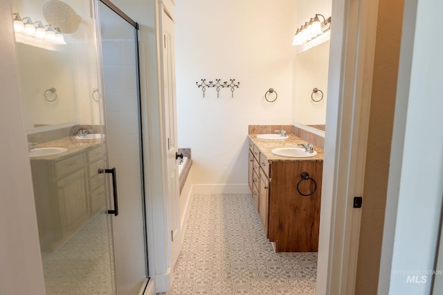 6023 S Augustine Ave, Boise, ID 83709 - bathroom with double vanity, a stall shower, and a bath