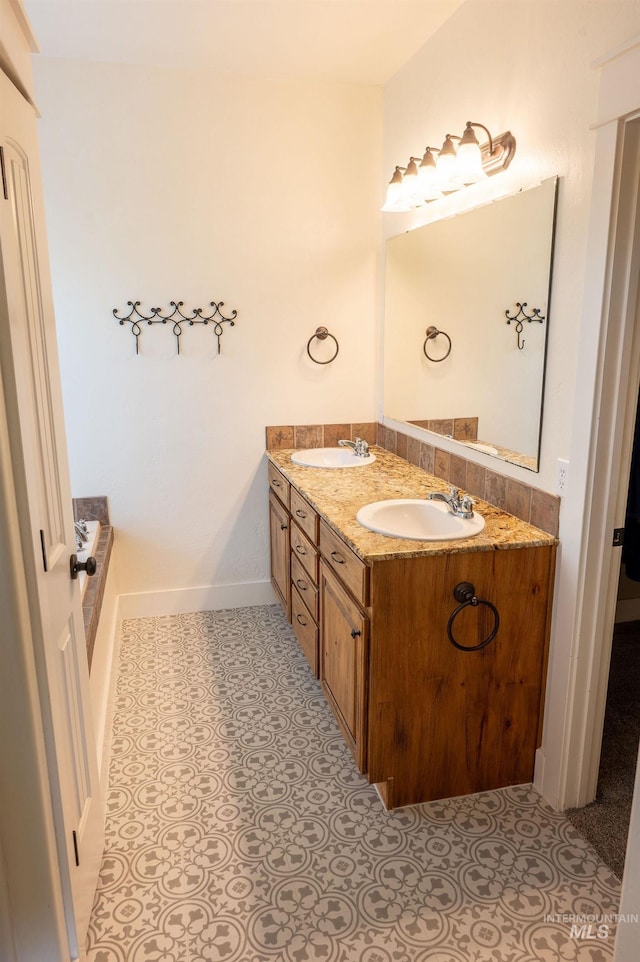 6023 S Augustine Ave, Boise, ID 83709 - full bath with double vanity, baseboards, and tile patterned flooring
