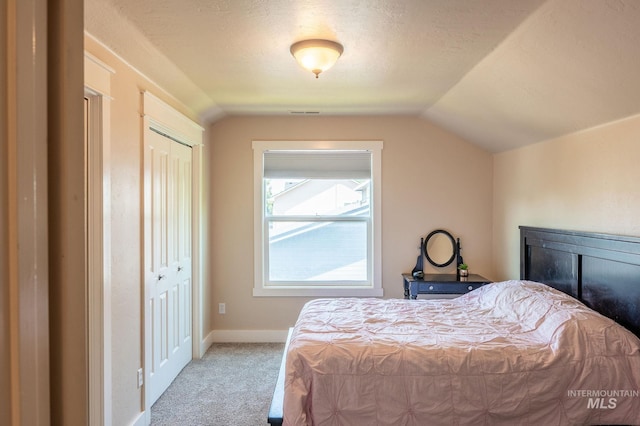 6023 S Augustine Ave, Boise, ID 83709 - carpeted bedroom featuring lofted ceiling and baseboards