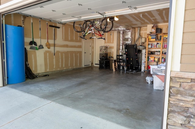 6023 S Augustine Ave, Boise, ID 83709 - garage featuring a garage door opener