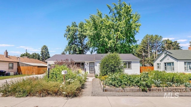 833 Nebraska, Gooding, ID 83330 - view of front of home with a vegetable garden