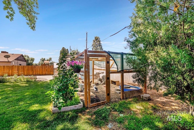 833 Nebraska, Gooding, ID 83330 - view of outbuilding featuring a vegetable garden