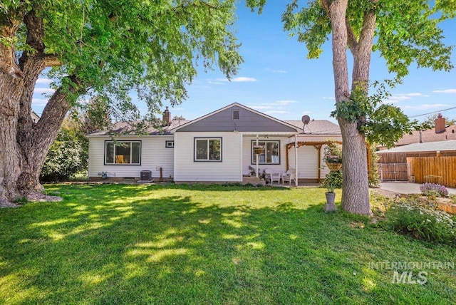 833 Nebraska, Gooding, ID 83330 - rear view of house featuring a patio