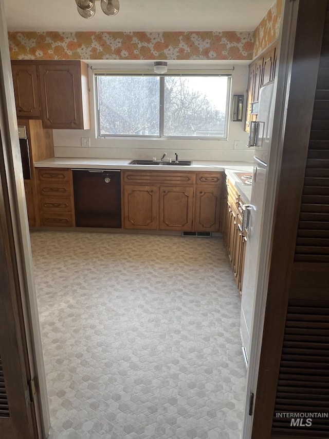 kitchen with dishwasher and sink