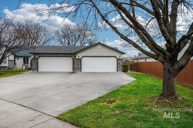 view of front facade with a front lawn and a garage