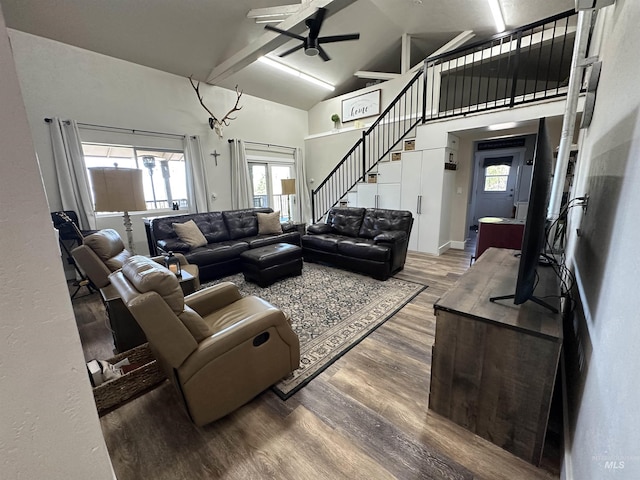 living room with high vaulted ceiling, ceiling fan, wood finished floors, and a wealth of natural light