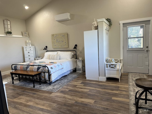 bedroom featuring baseboards, dark wood-type flooring, recessed lighting, a wall unit AC, and vaulted ceiling