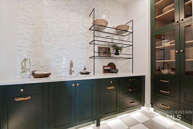 bar with backsplash and a sink