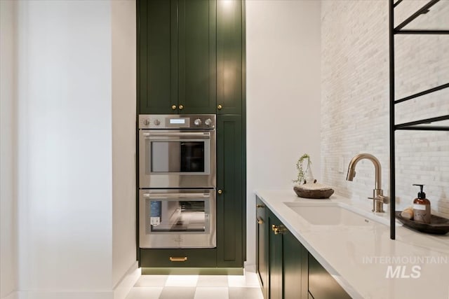 bar with double oven, backsplash, and a sink