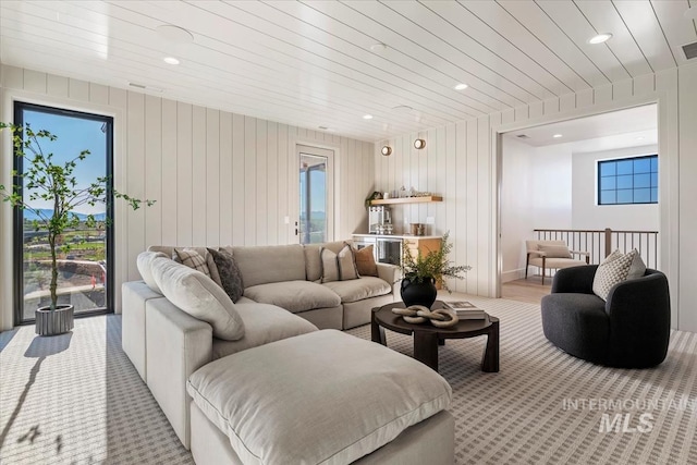 living room with a wealth of natural light and recessed lighting