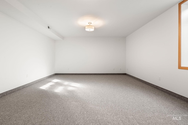 spare room with carpet