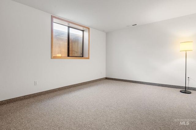 view of carpeted spare room