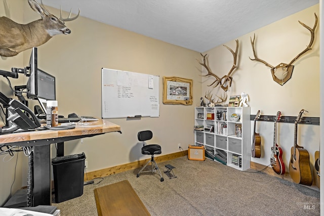 interior space featuring carpet flooring and baseboards