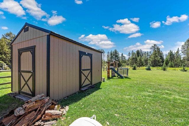 view of shed with fence