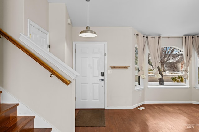 10748 W Hazelwood, Star, ID 83669 - foyer with stairway, hardwood / wood-style floors, and baseboards