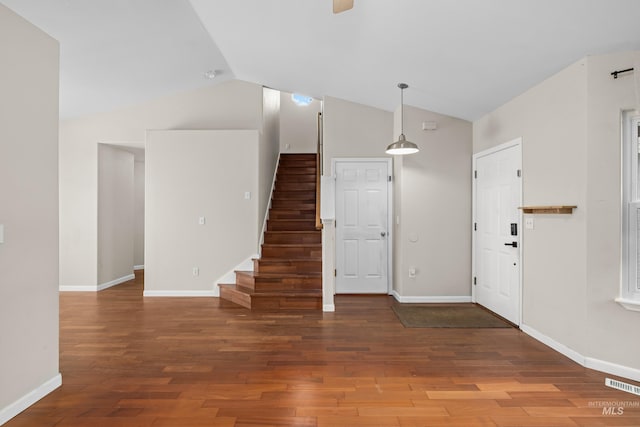 entryway featuring lofted ceiling, wood finished floors, and visible vents