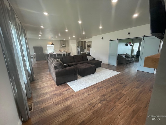 1111 Thunder Mountain St, Kimberly, ID 83341 - living room with a barn door, dark wood finished floors, and recessed lighting