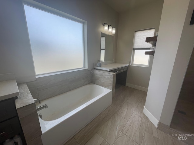 1111 Thunder Mountain St, Kimberly, ID 83341 - full bathroom with vanity, plenty of natural light, and a garden tub
