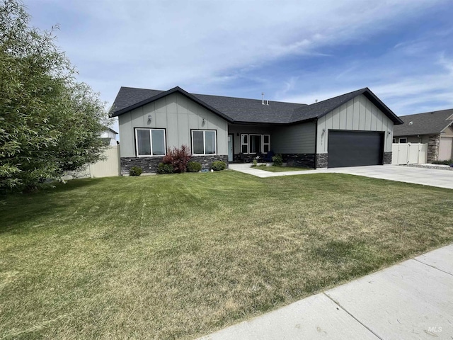 1111 Thunder Mountain St, Kimberly, ID 83341 - view of front facade with stone siding, concrete driveway, board and batten siding, a garage, and a shingled roof