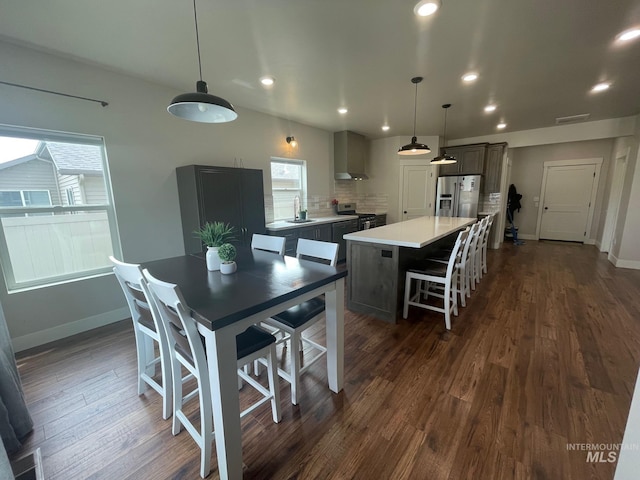 1111 Thunder Mountain St, Kimberly, ID 83341 - dining area featuring dark wood-style floors, baseboards, and recessed lighting