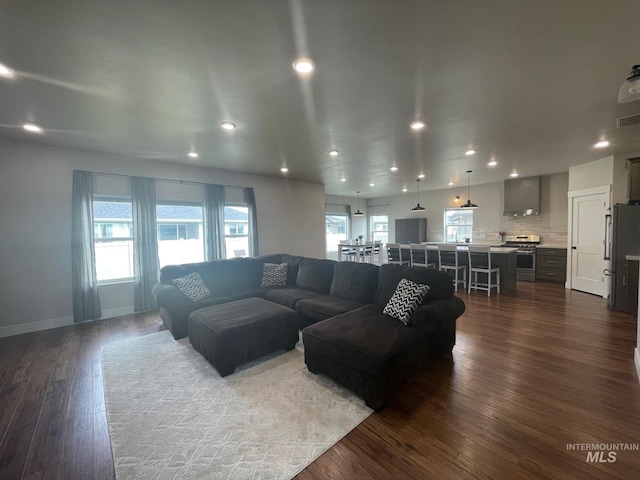 1111 Thunder Mountain St, Kimberly, ID 83341 - living area with dark wood-type flooring, recessed lighting, and baseboards