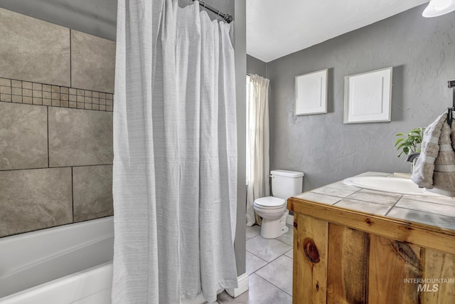 full bathroom featuring a textured wall, toilet, tile patterned floors, shower / bathtub combination with curtain, and vanity