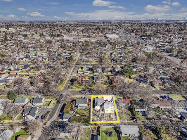 birds eye view of property with a residential view