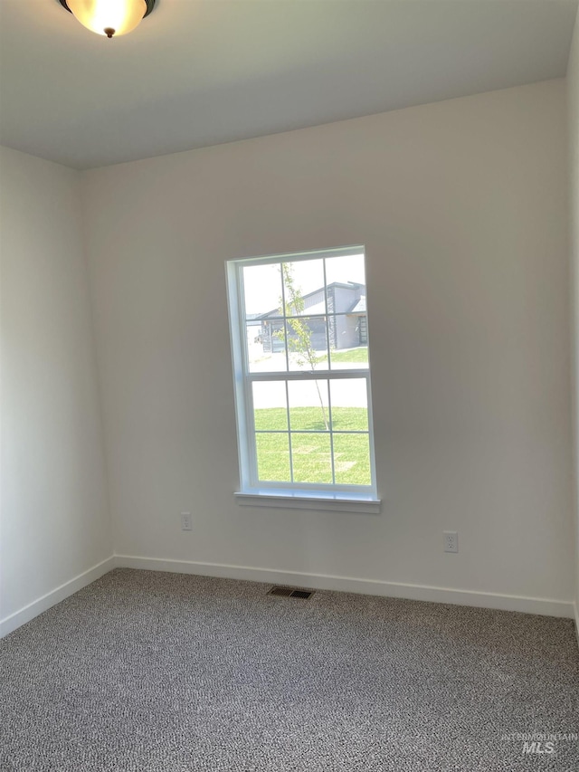 484 Hope Ave, Twin Falls, ID 83301 - carpeted spare room featuring baseboards