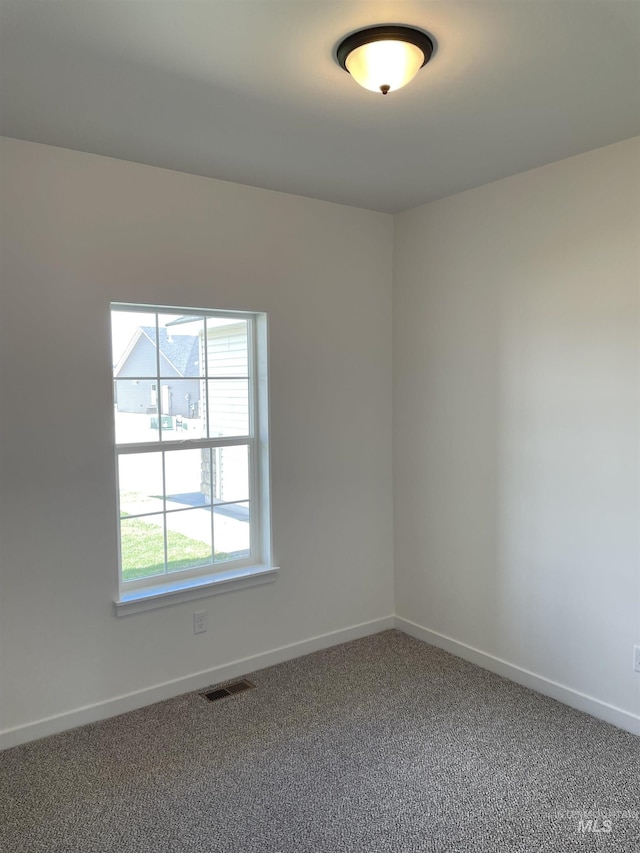 484 Hope Ave, Twin Falls, ID 83301 - carpeted spare room with baseboards