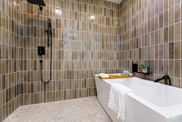 bathroom featuring separate shower and tub