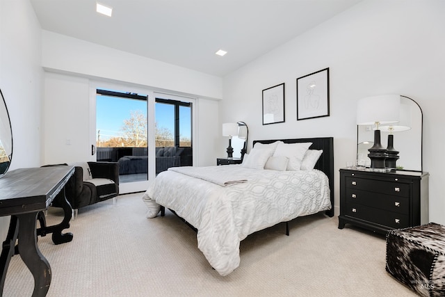 carpeted bedroom featuring access to outside