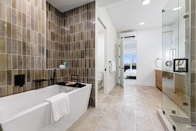 full bathroom with toilet, tile walls, tile patterned floors, a wall unit AC, and plus walk in shower