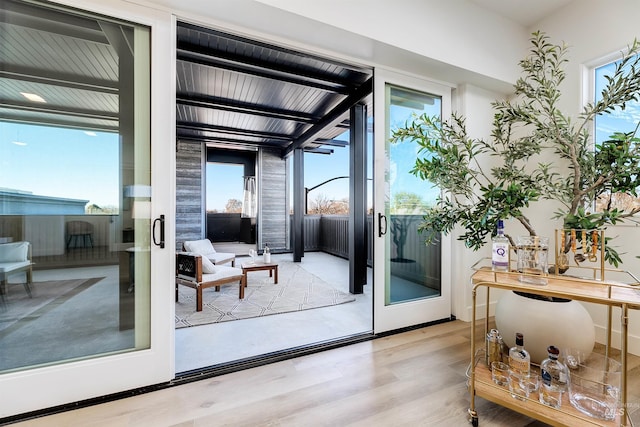 entryway with light hardwood / wood-style floors