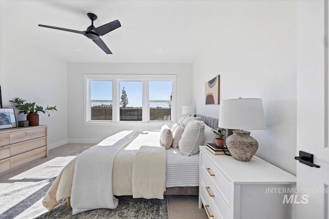 8447 W Happy Day Dr, Meridian, ID 83646 - bedroom featuring a ceiling fan and baseboards