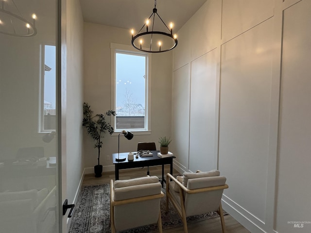 8447 W Happy Day Dr, Meridian, ID 83646 - office area with a chandelier, wood finished floors, and baseboards