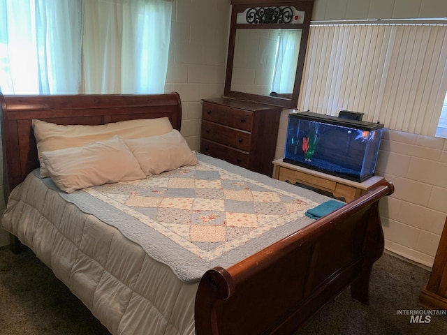 2409 S Ohio, Caldwell, ID 83605 - carpeted bedroom with concrete block wall
