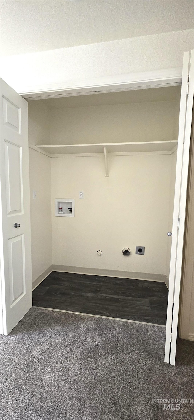 washroom with washer hookup, hookup for an electric dryer, carpet flooring, a textured ceiling, and laundry area