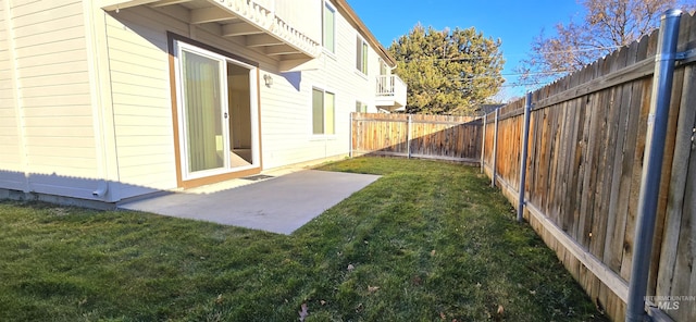 view of yard with a fenced backyard and a patio